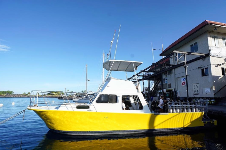 a small boat in a body of water